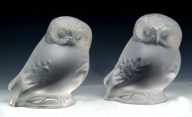 Appraisal: A PAIR OF LALIQUE GLASS MODELS OF OWLS signed in