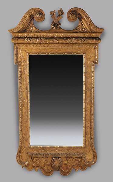 Appraisal: A Georgian-Style Carved and Gilded Mirror early th c the