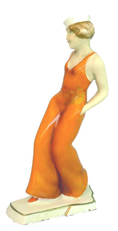 Appraisal: Czechoslovakian 's figure of a sailor girl in unusual orange