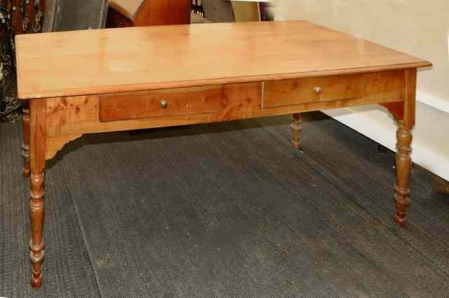 Appraisal: A FRENCH FRUITWOOD RECTANGULAR FARMHOUSE KITCHEN TABLE with plank top