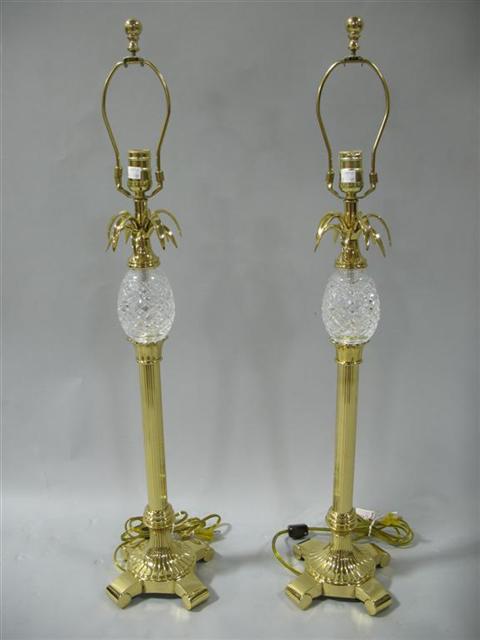 Appraisal: PAIR OF WATERFORD GILT AND CRYSTAL LAMPS The tall buffet