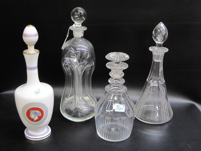 Appraisal: FOUR GLASS LIQUOR DECANTERS three in clear glass from to