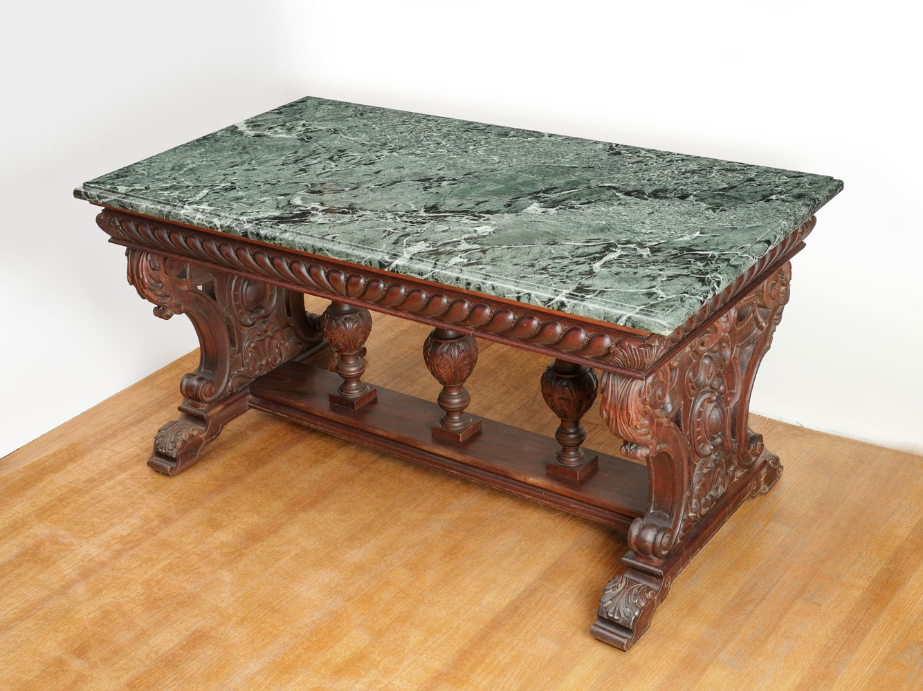 Appraisal: RENAISSANCE REVIVAL MARBLE TOP LIBRARY TABLE Green beveled marble top