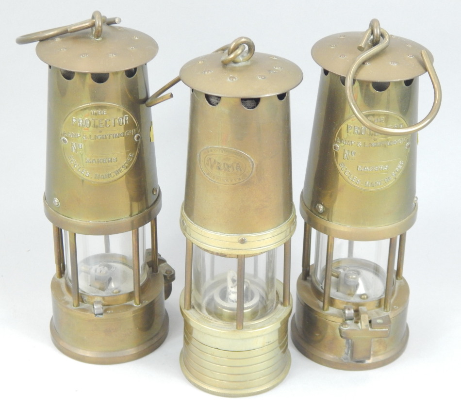 Appraisal: Three brass miners lamps to include two protector lamps the