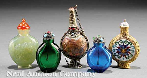 Appraisal: A Group Five Chinese Snuff Bottles the first pale green