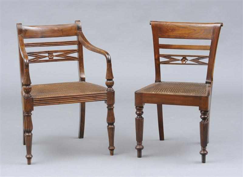 Appraisal: ANGLO INDIAN HARDWOOD AND CANED ARMCHAIR With pierced back splat