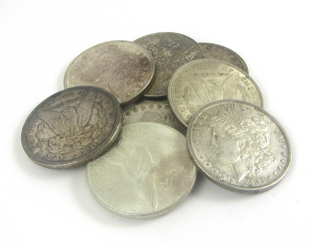 Appraisal: EIGHT U S SILVER DOLLARS Morgan and Peace type mint