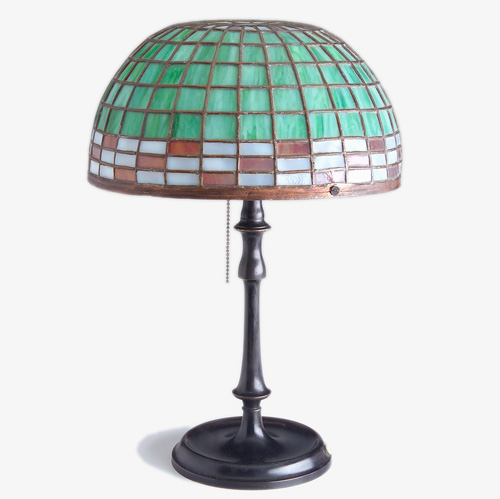 Appraisal: ARTS CRAFTS Table lamp with a hemispherical geometric leaded glass