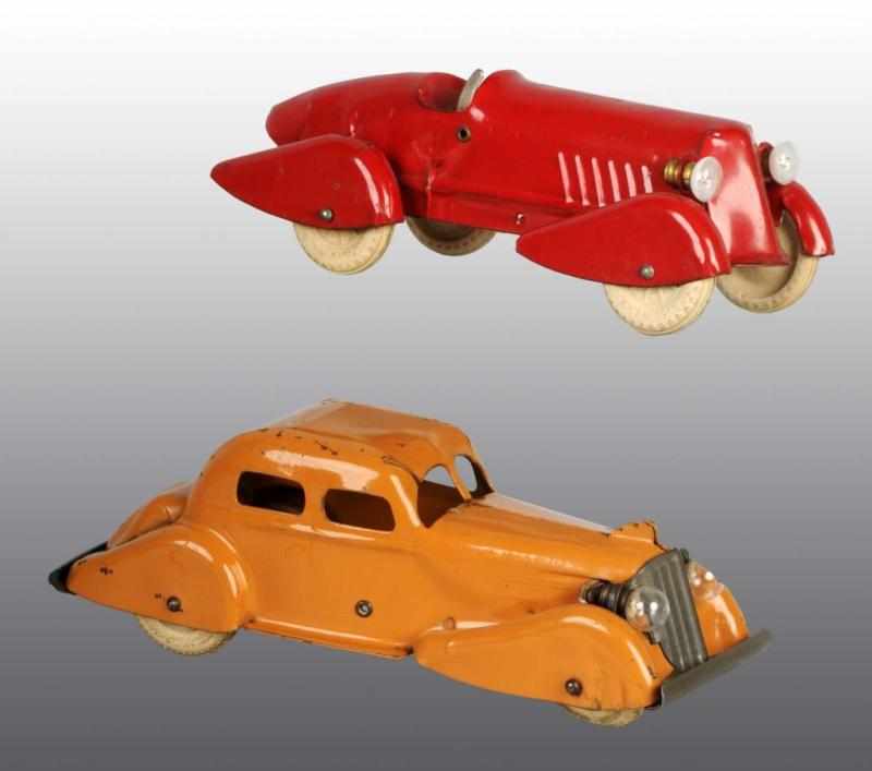 Appraisal: Lot of Pressed Steel Wyandotte Automobile Toys Description American Includes