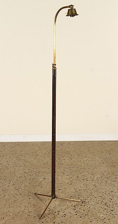 Appraisal: LEATHER BRONZE FLOOR LAMP MANNER JACQUES ADNET A leather and