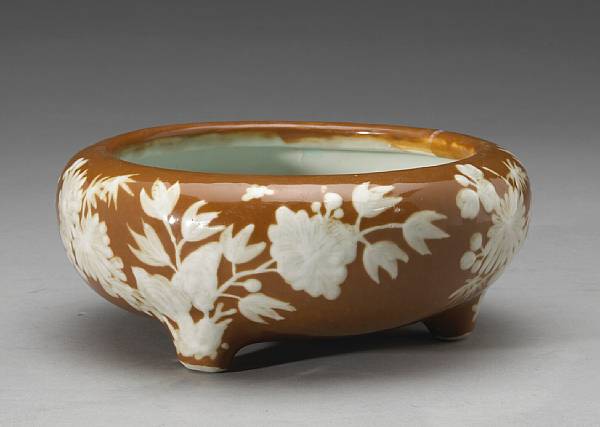 Appraisal: A 'caf -au-lait' glazed porcelain censer with white slip decoration