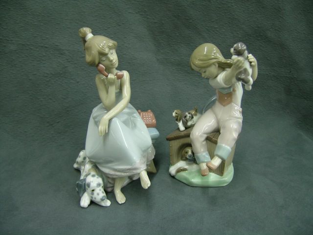 Appraisal: Two Lladro Figurines of young girls with dogs Pick of