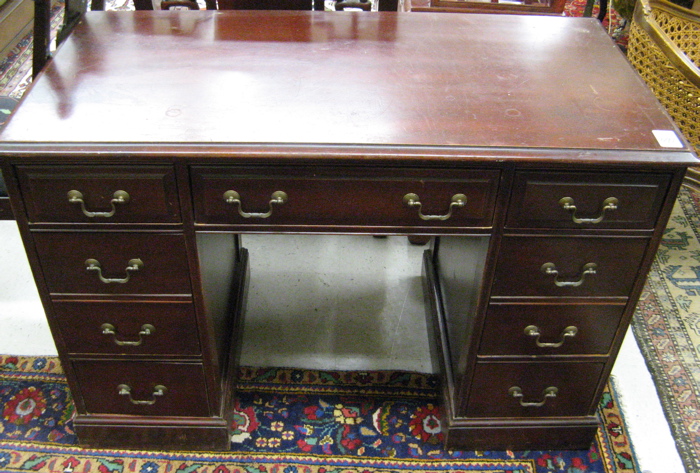 Appraisal: MAHOGANY WRITING DESK AND CHAIR American mid th century The