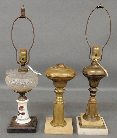 Appraisal: - Two brass oil lamps with alabaster bases tallest to