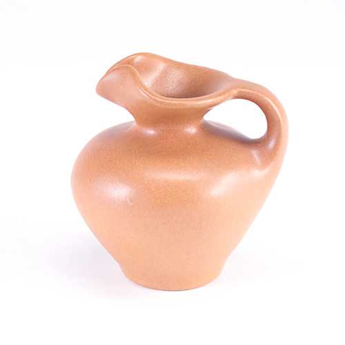 Appraisal: TECO Small pitcher covered in smooth matte brown glaze Stamped