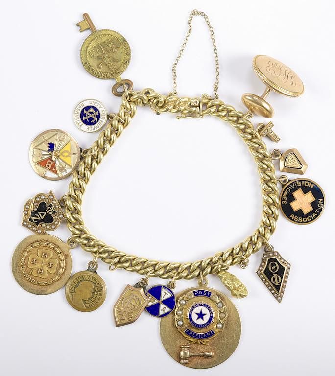 Appraisal: Ed Hicks Masonic Gold Charm K Bracelet K charm bracelet