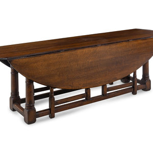 Appraisal: A William and Mary Style Oak Drop-Leaf Table th Century