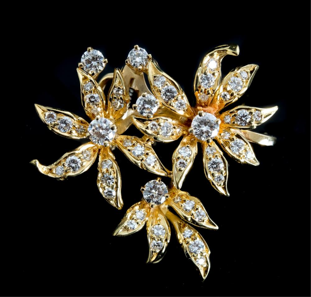 Appraisal: ESTATE K YELLOW GOLD DIAMOND BROOCH CLIPEstate k yellow gold