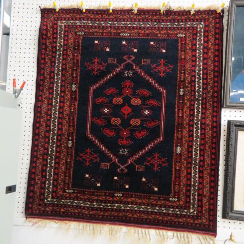 Appraisal: Beluchi Persian Handmade Rug center having stylized flowers on indigio