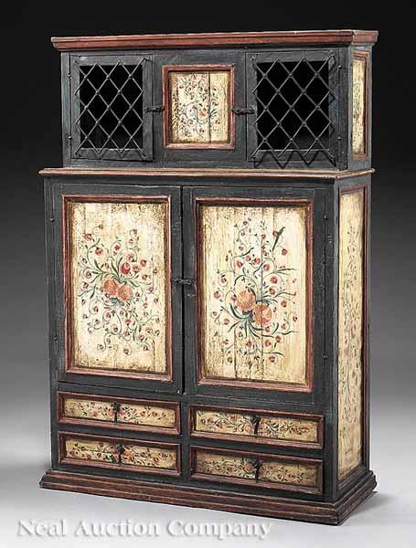 Appraisal: A Continental Paint-Decorated Cupboard polychrome floral decoration upper iron grille