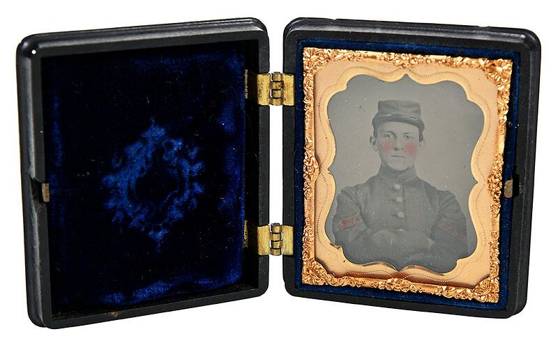 Appraisal: Confederate Artillery Soldier Ambrotype ninth plate thermoplastic case with artillery