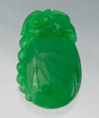 Appraisal: A Carved Green Jadeite Pendant Carved in the form of