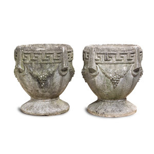 Appraisal: A Pair of Cast Stone Jardini res Height x width