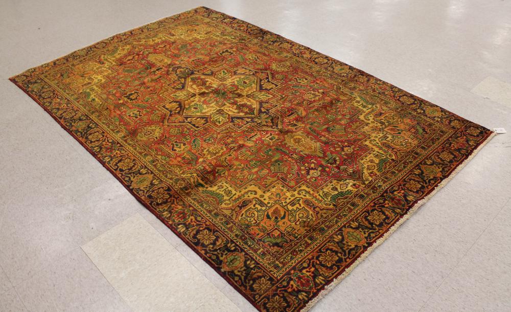 Appraisal: SEMI-ANTIQUE PERSIAN CARPET Heriz design hand knotted ' x '