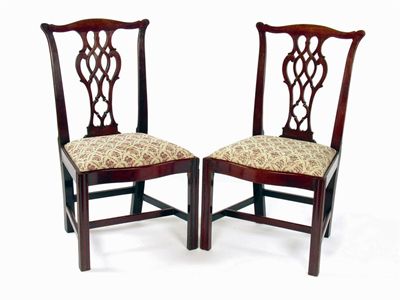 Appraisal: A pair of George III mahogany side chairs with pierced