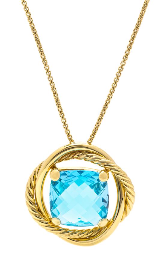 Appraisal: Sale Lot An Karat Yellow Gold and Blue Topaz Infinity