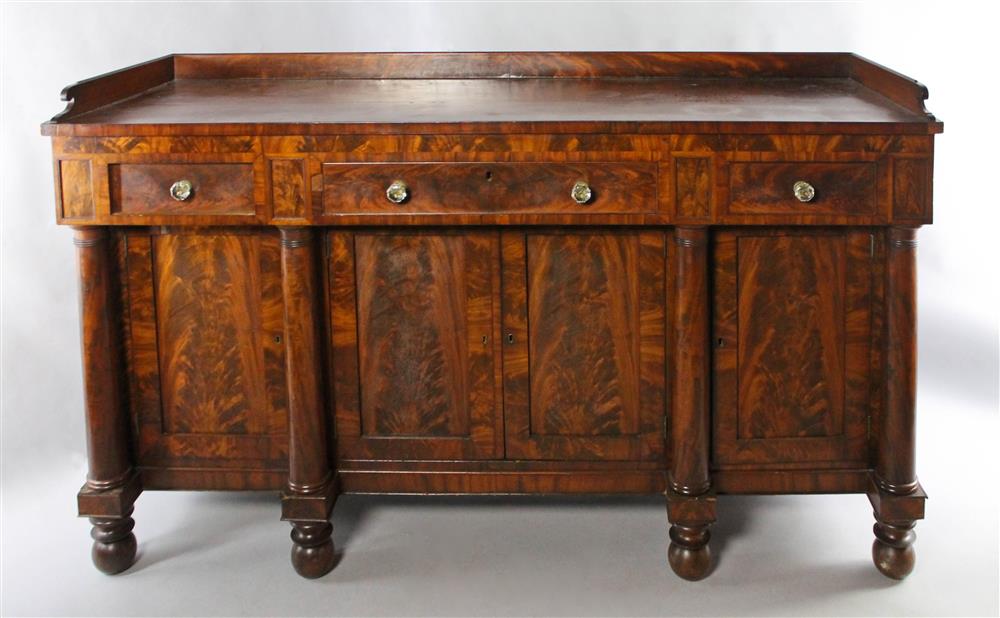 Appraisal: AMERICAN CLASSICAL MAHOGANY SIDEBOARD having a rectangular top with gallery