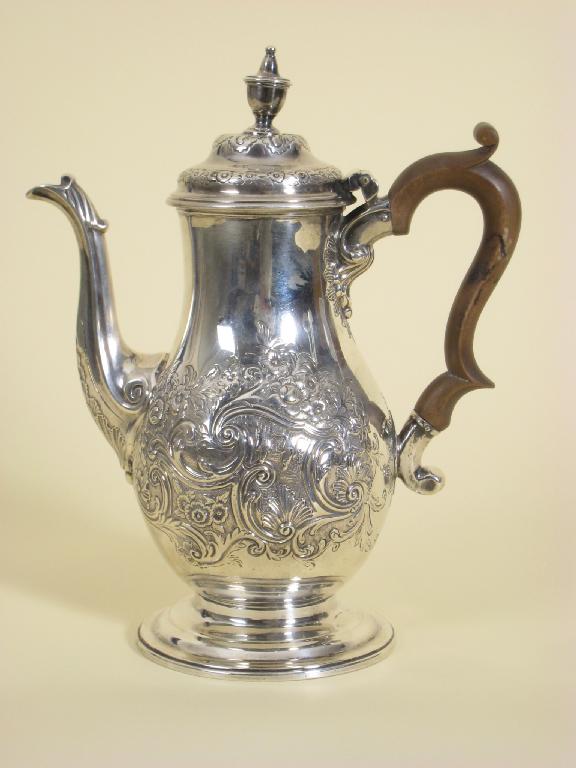 Appraisal: A George III Coffee Pot of baluster shape floral and