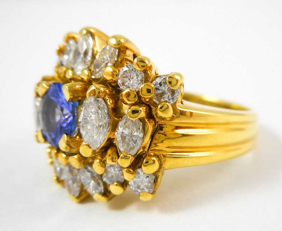 Appraisal: TANZANITE DIAMOND AND FOURTEEN KARAT GOLD RING with ten marquise-cut