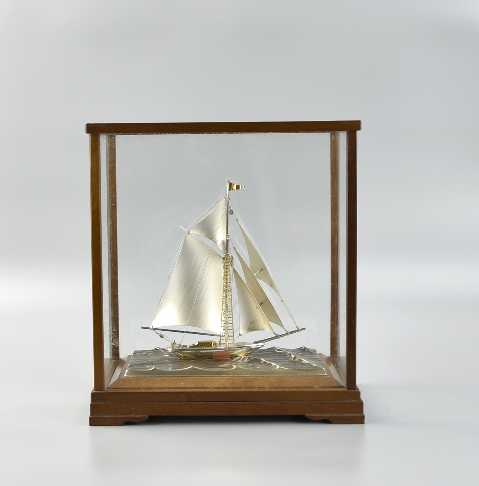 Appraisal: A JAPANESE STERLING SILVER SAILBOAT IN SHOWCASE A Japanese silver