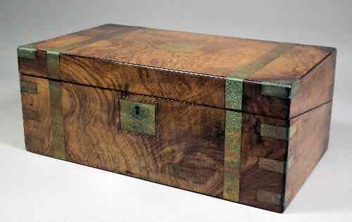 Appraisal: A Victorian brass bound walnut writing box the lifting top