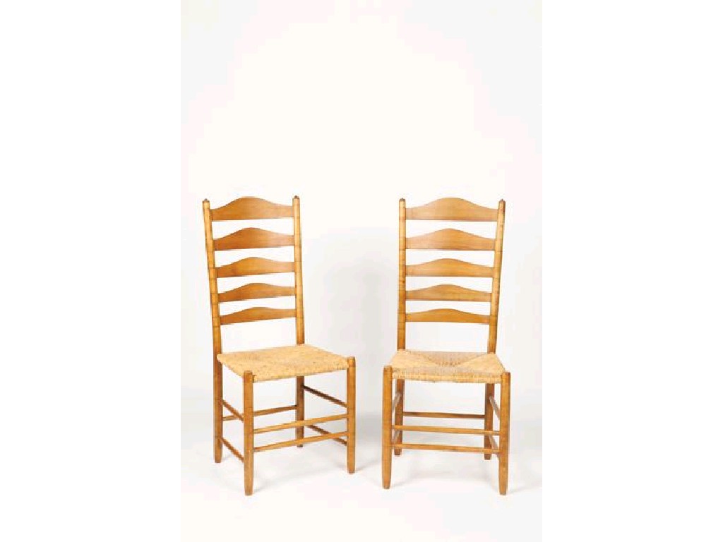 Appraisal: LAWRENCE NEAL A PAIR OF CLISSETT PATTERN LADDERBACK SIDE CHAIRS