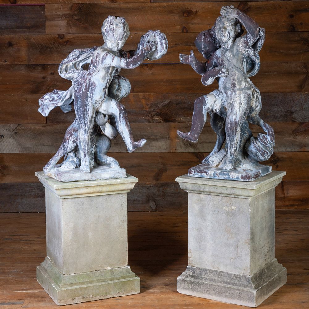 Appraisal: Two Cast Lead Figures of Two Frolicking Youths ft x