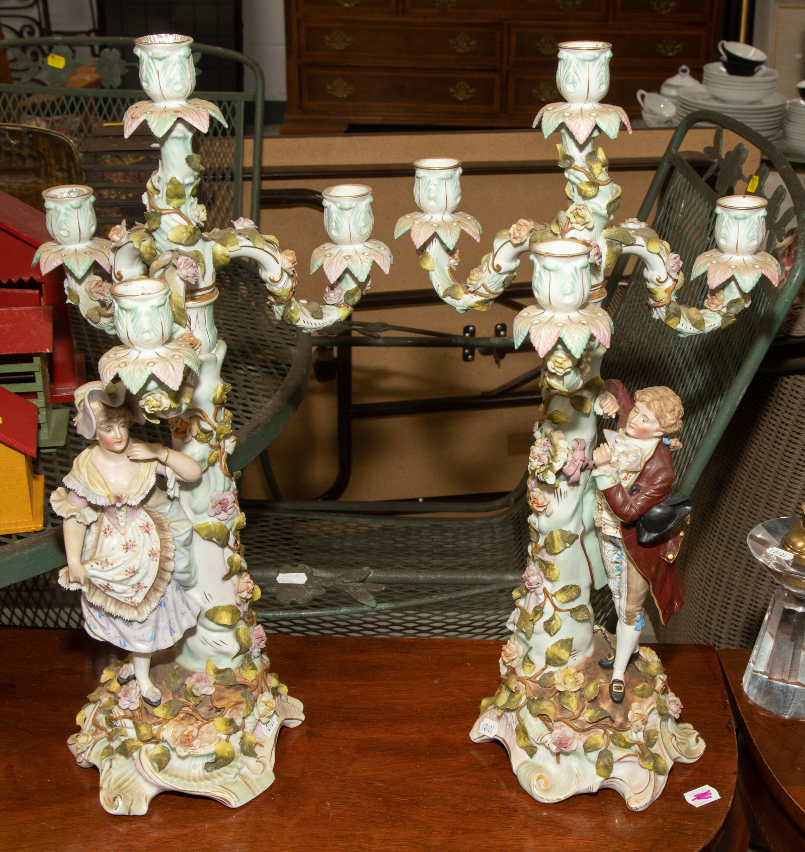 Appraisal: A PAIR OF GERMAN PORCELAIN FIGURAL CANDELABRA Late th century