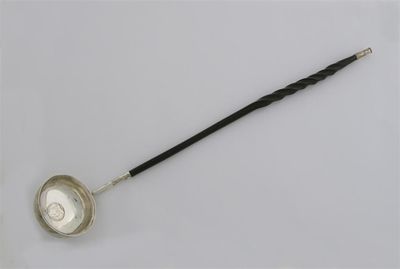 Appraisal: A George III punch ladle with a twisted whalebone handle