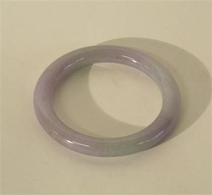 Appraisal: Large celadon jade bangle braceletRound smoothly-carved bangle with some lavender