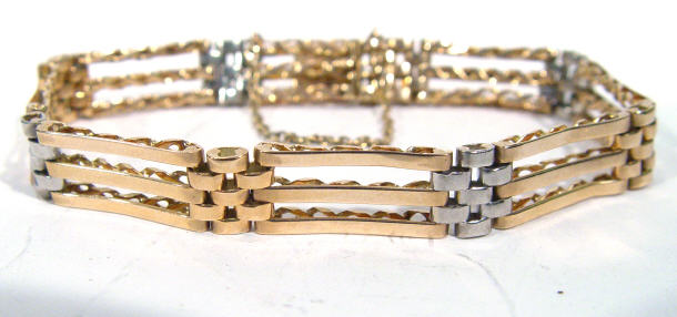 Appraisal: Two tone gold ladies bracelet