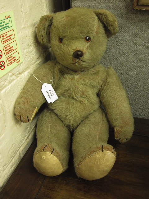 Appraisal: AN OLD PLUSH TEDDY BEAR with jointed arms and legs