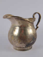 Appraisal: A small silver cream jug Birmingham wt gm