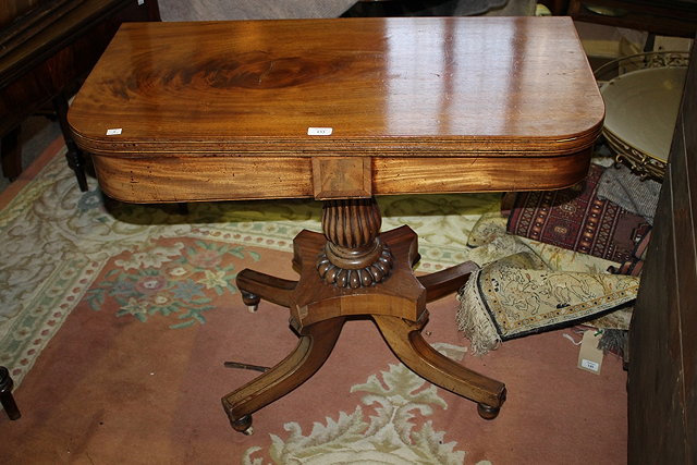 Appraisal: A TH CENTURY MAHOGANY 'D' SHAPED FOLD-OVER TEA TABLE having