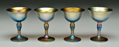 Appraisal: Set of four Tiffany stems iridescent blue with gold and