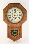 Appraisal: CLOCK - Circa oak Ansonia wall clock Brass works time