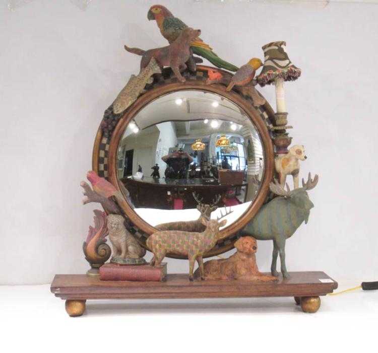 Appraisal: MACKENZIE-CHILDS INSPIRED DRESSING TABLE MIRROR a round convex mirror encompassed