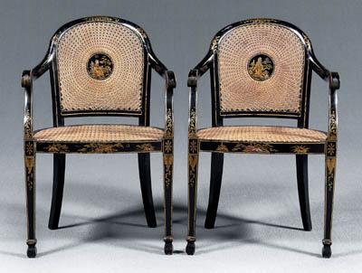 Appraisal: Pair Georgian style japanned armchairs with caned back and seat