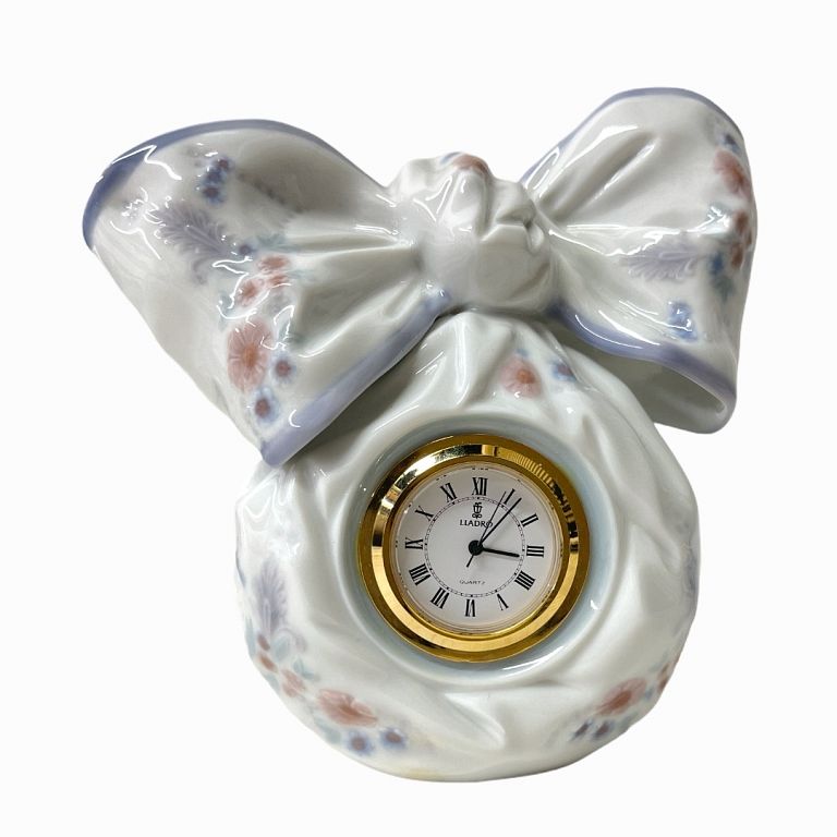 Appraisal: Lladro Porcelain Bow Clock Spanish porcelain clock The clock is