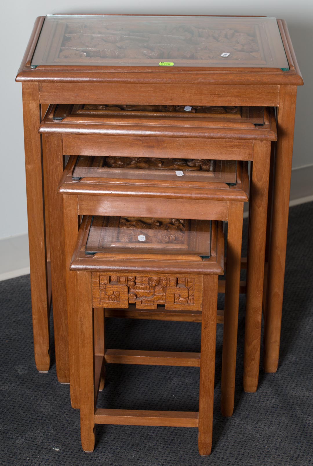 Appraisal: Oriental style stacking tables with glass tops